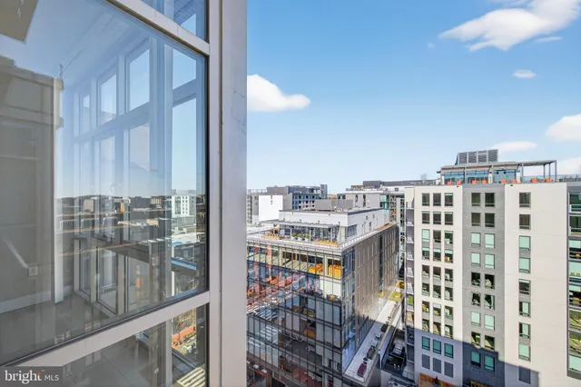 a view of a balcony with city view