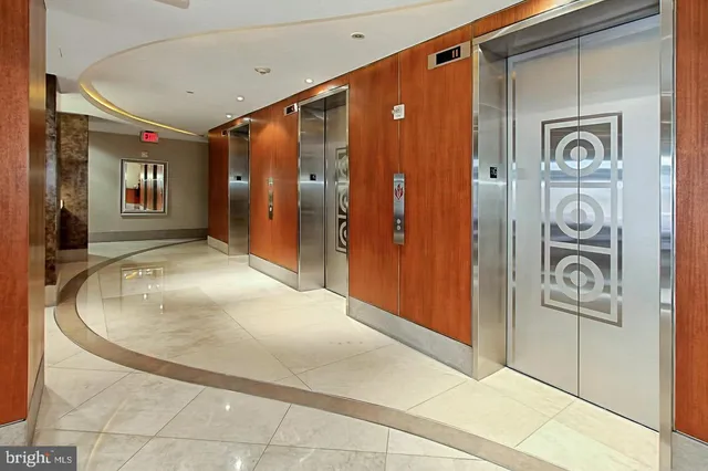 a view of a hallway with bathroom