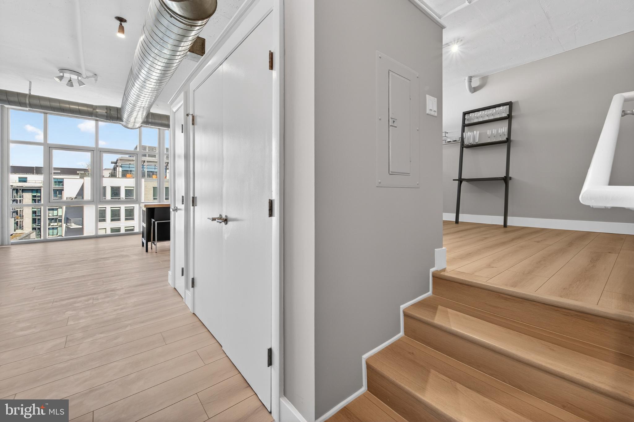 811 4th Street Northwest, Unit 1215 Washington, DC 20001 - Photo 8 of 32 a view of entryway and hall with wooden floor