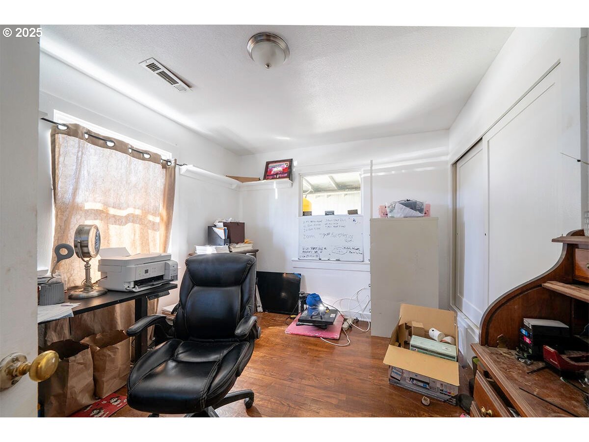 176 Reager Street Medford, OR 97501 - Photo 12 of 48 a living room with furniture and a flat screen tv