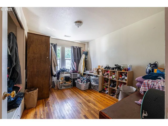 a backyard of a house with barbeque oven