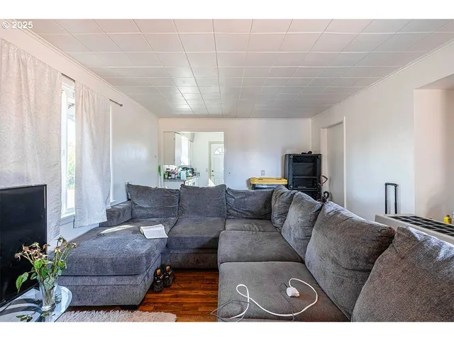 a kitchen with stainless steel appliances granite countertop a refrigerator sink and stove