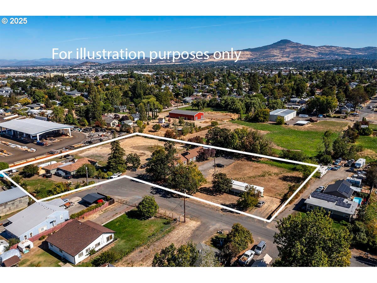 176 Reager Street Medford, OR 97501 - Photo 2 of 48 a view of a city from a balcony
