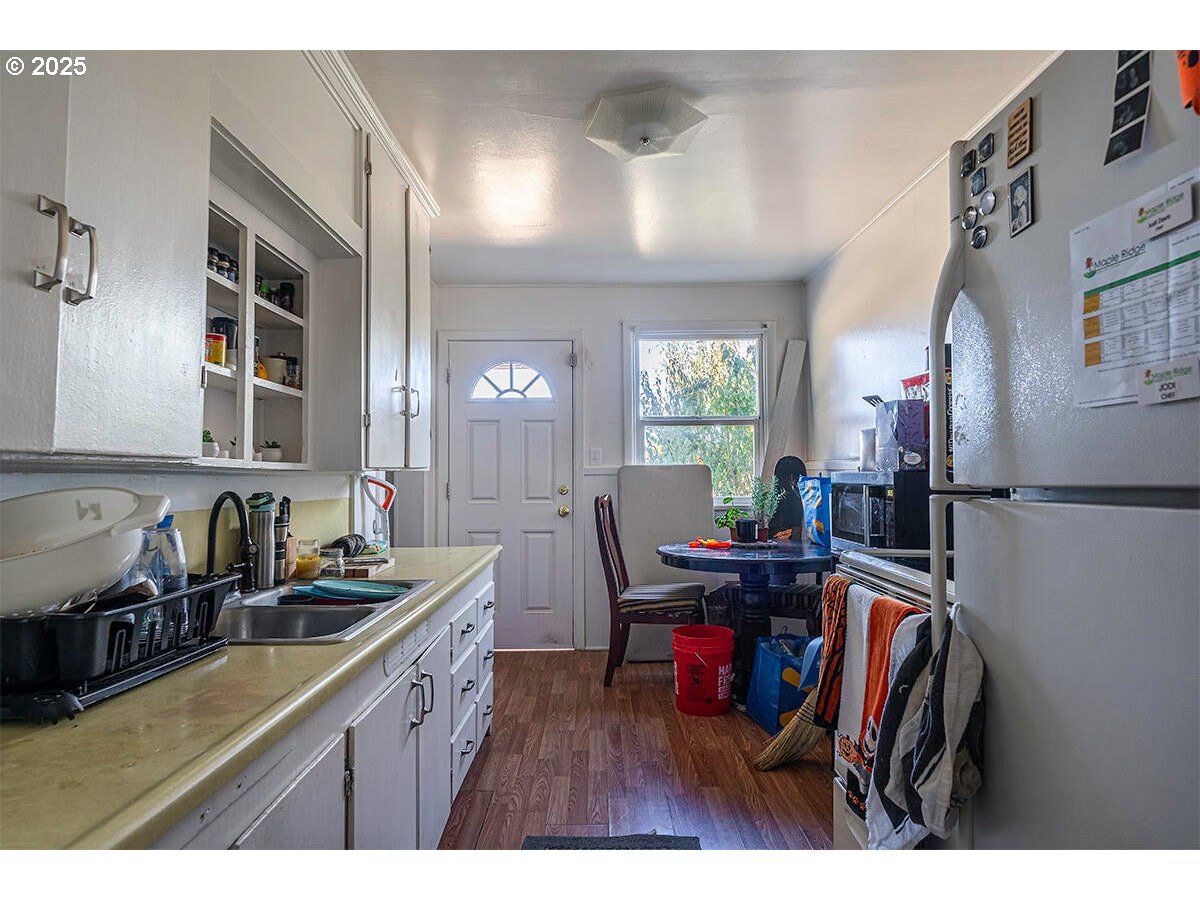 176 Reager Street Medford, OR 97501 - Photo 33 of 48 a kitchen view of a dining table chairs and entryway