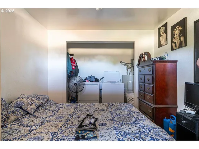 a bathroom with a sink mirror and vanity
