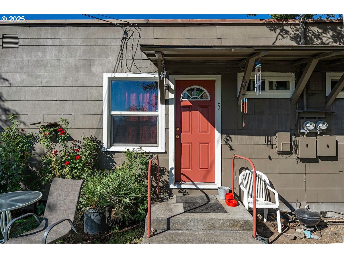176 Reager Street Medford, OR 97501 - Photo 37 of 48 a view of front door and potted plants