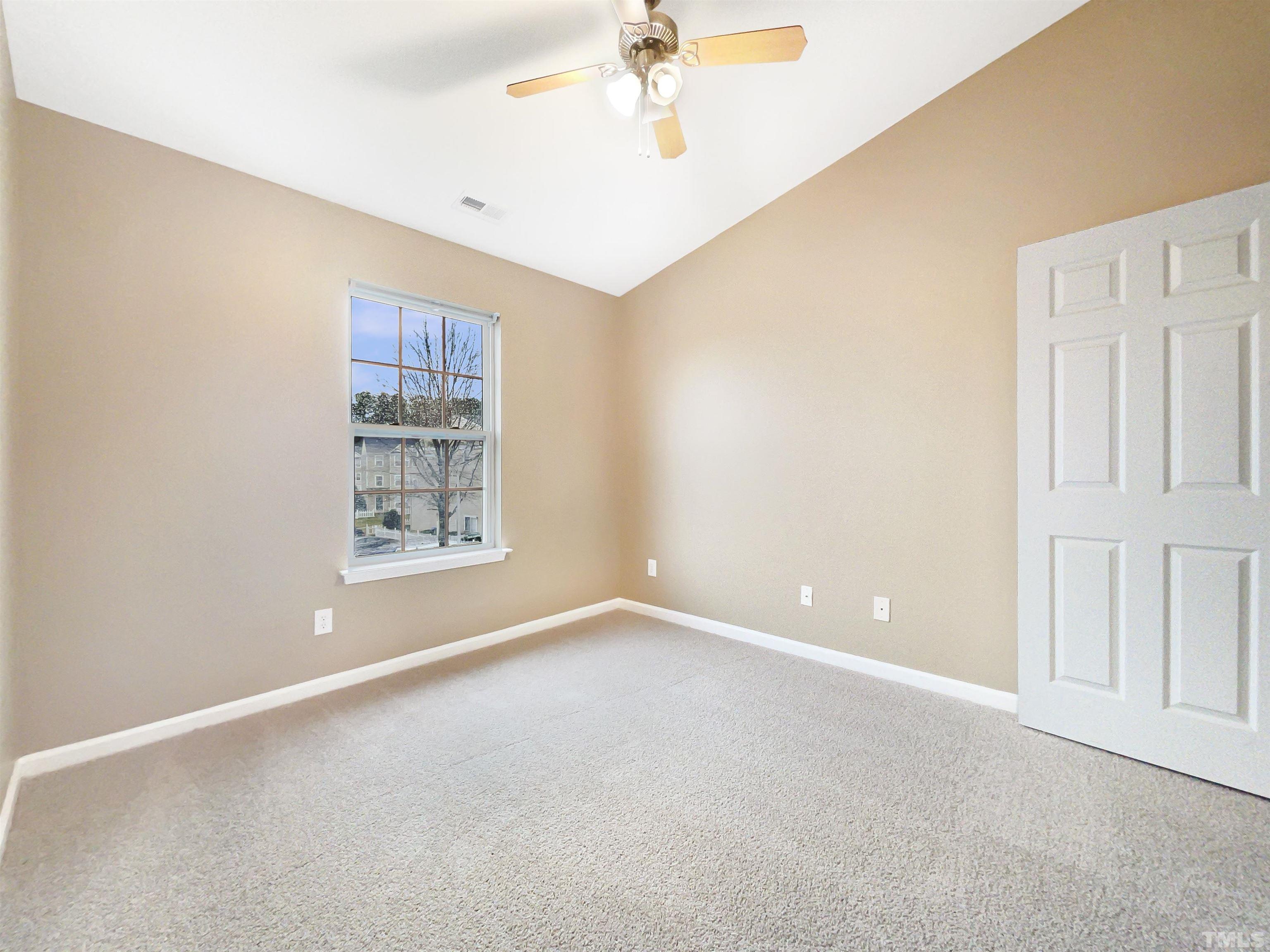5115 Neuse Commons Lane Raleigh, NC 27616 - Photo 17 of 22 a view of an empty room with a window