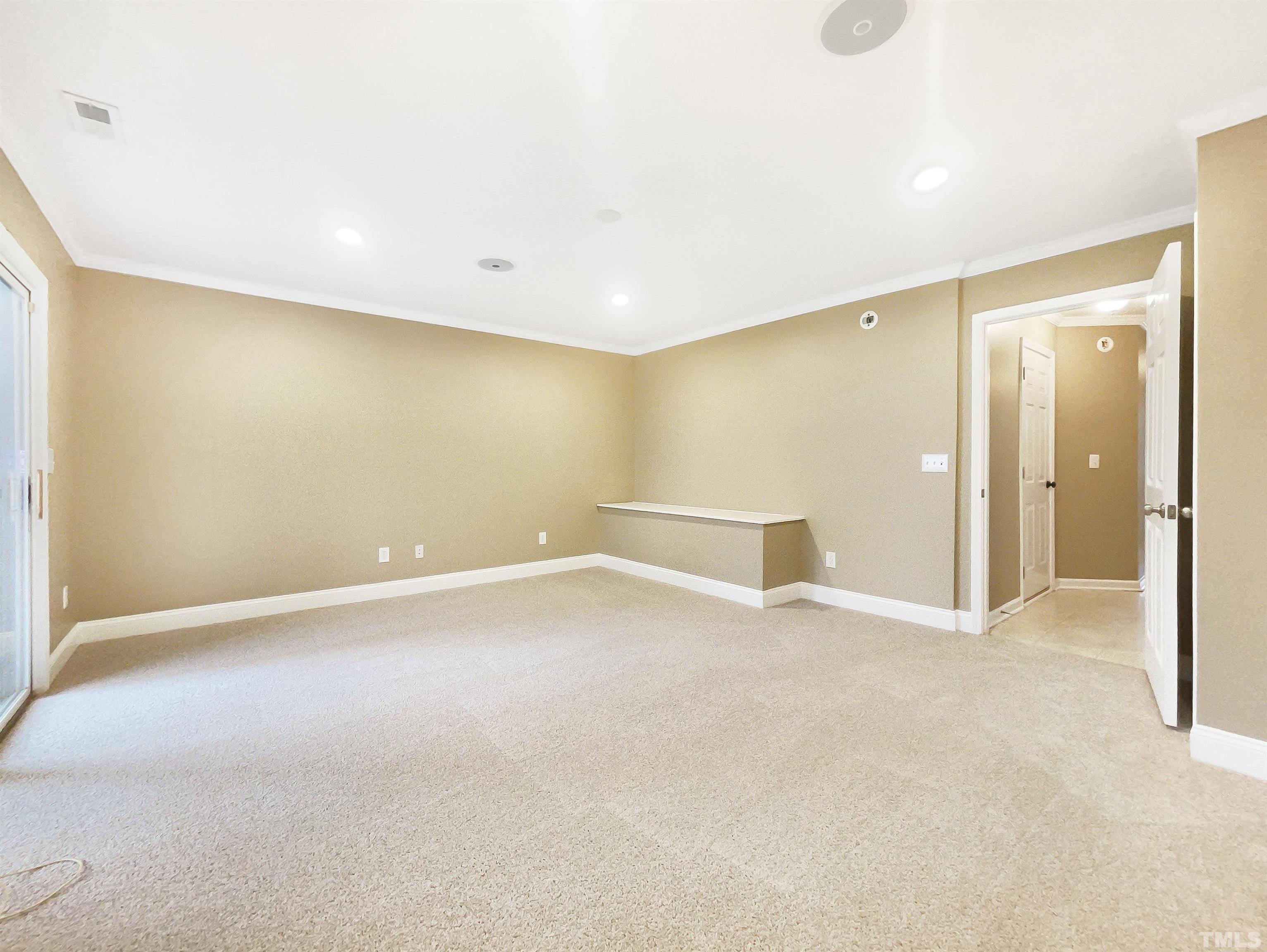 5115 Neuse Commons Lane Raleigh, NC 27616 - Photo 8 of 22 an empty room with a natural light