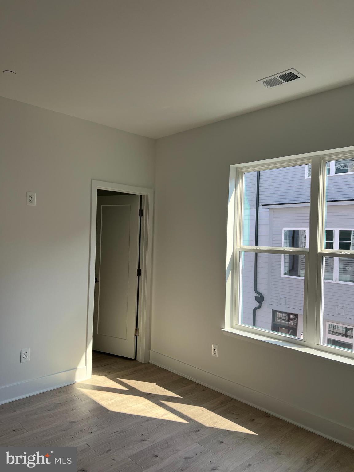 2139 Tysons Ridgeline Road Falls Church, VA 22043 - Photo 14 of 25 an empty room with windows