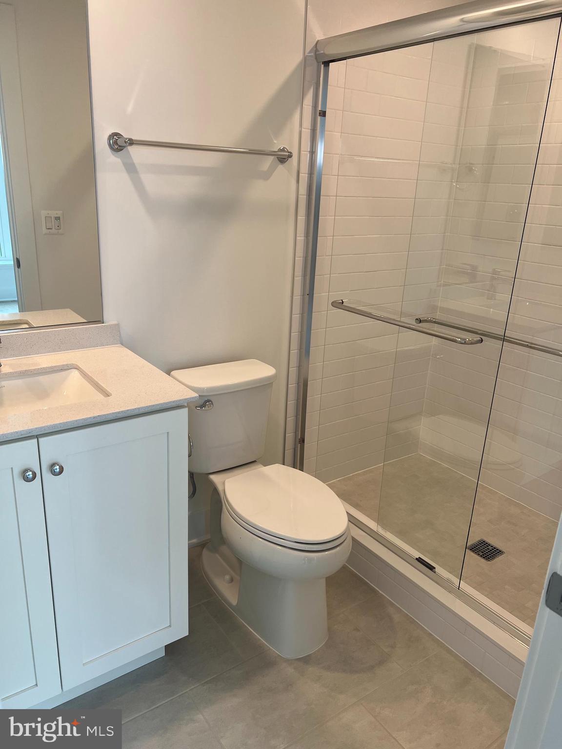 2139 Tysons Ridgeline Road Falls Church, VA 22043 - Photo 3 of 25 a bathroom with a toilet and a shower