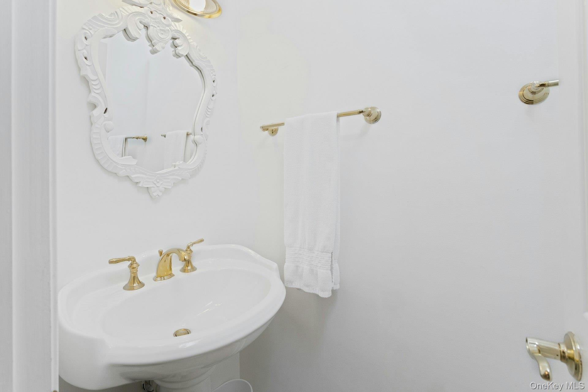 67 Winchester Avenue Peekskill, NY 10566 - Photo 12 of 26 a bathroom with a white bath tub