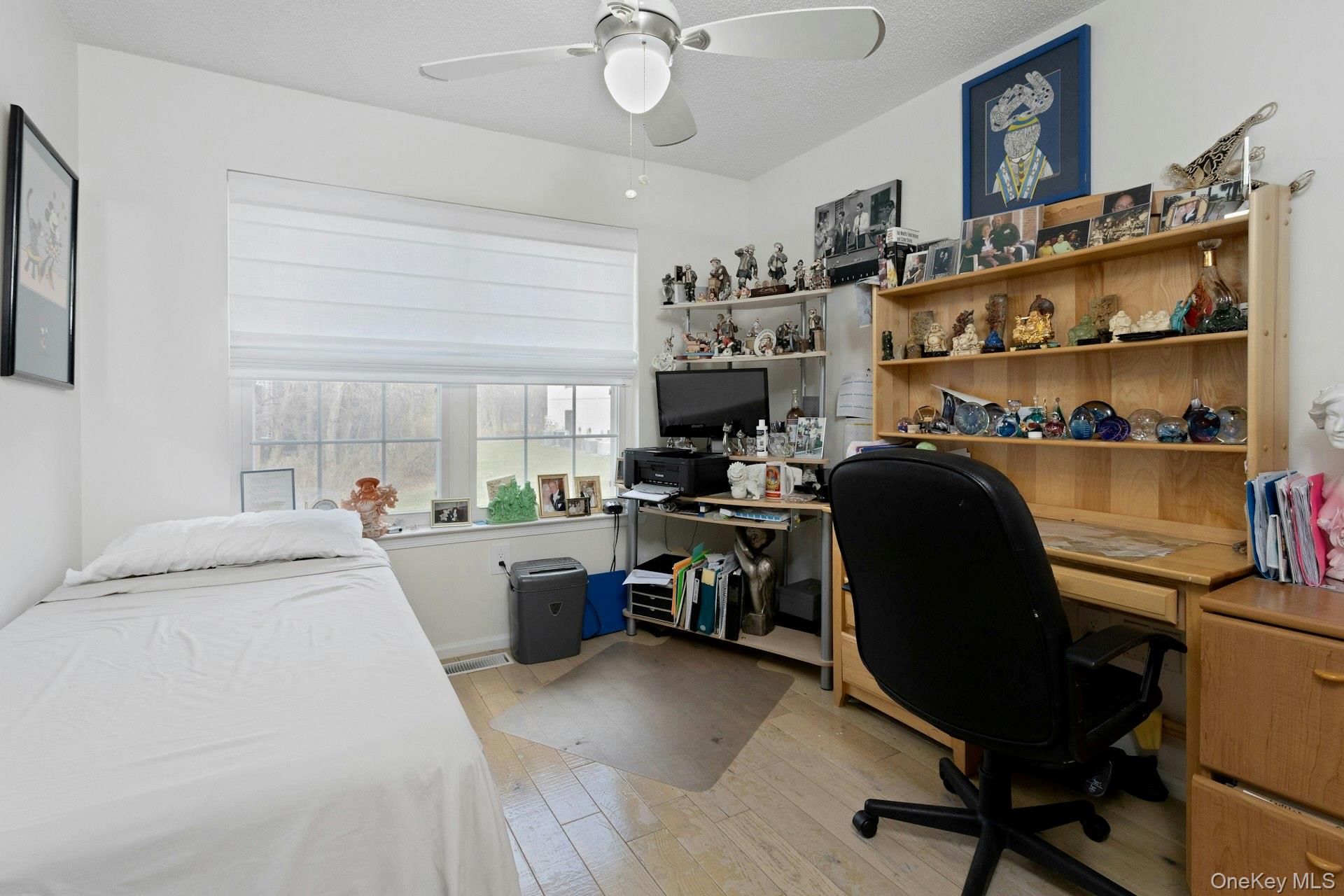 67 Winchester Avenue Peekskill, NY 10566 - Photo 18 of 26 a view of a workspace with furniture and a kitchen