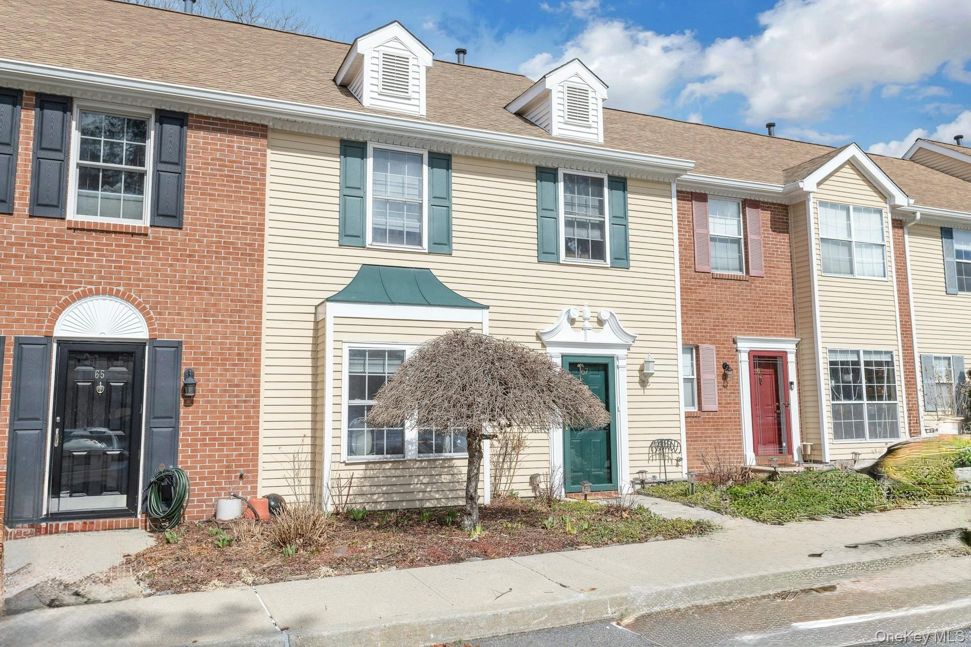 67 Winchester Avenue Peekskill, NY 10566 - Photo 2 of 26 a front view of a house