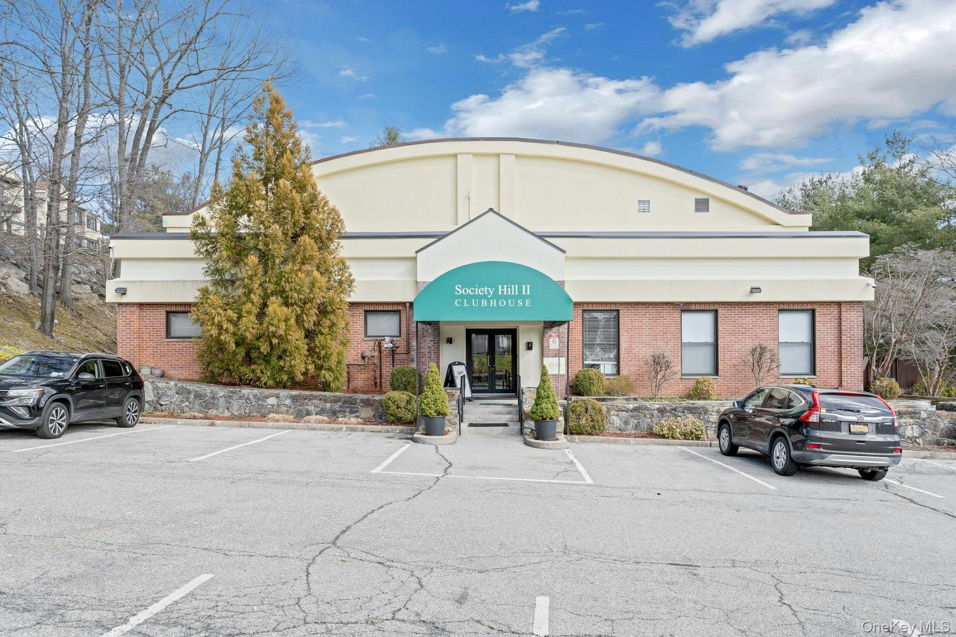 67 Winchester Avenue Peekskill, NY 10566 - Photo 22 of 26 a car parked in front of a building