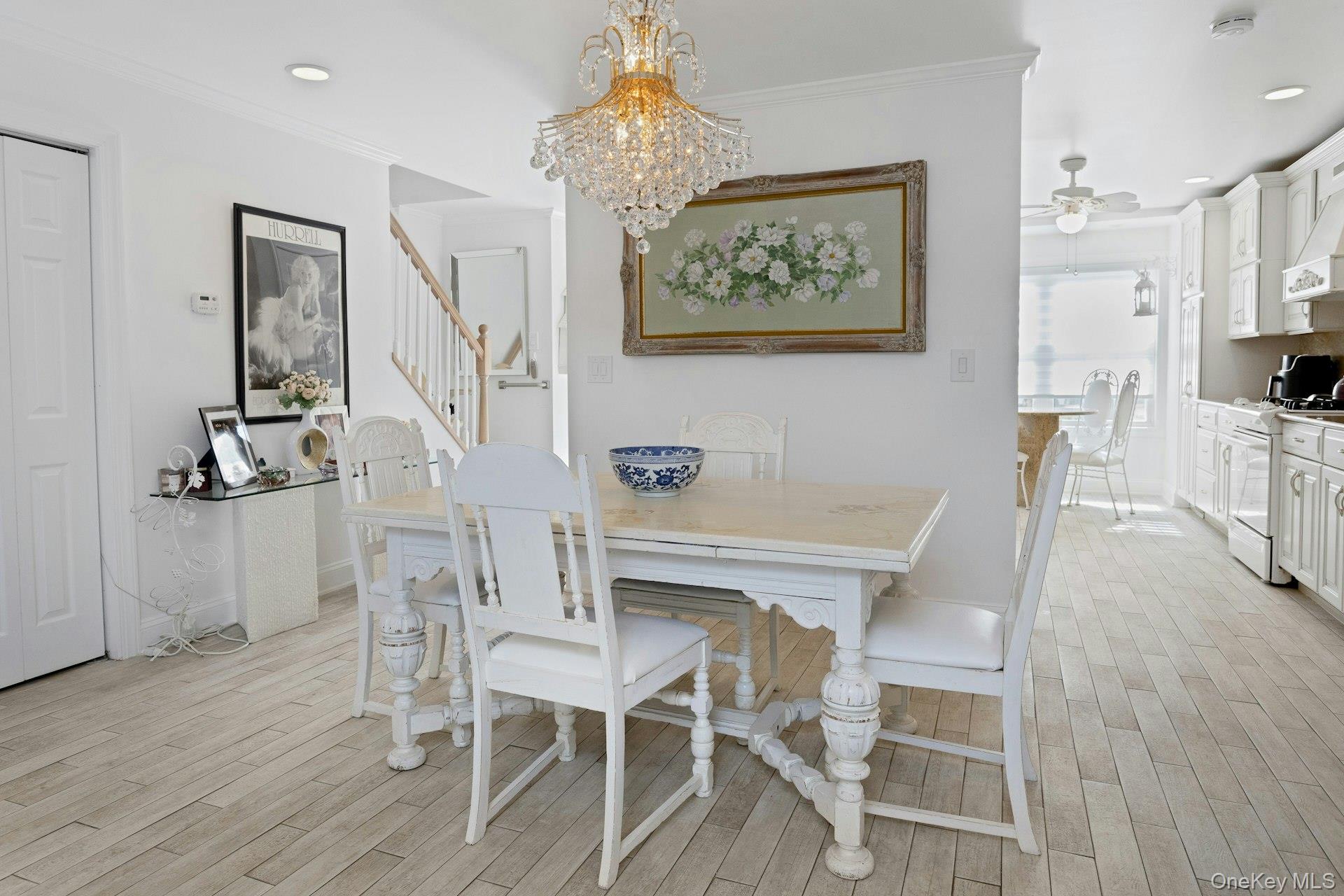 67 Winchester Avenue Peekskill, NY 10566 - Photo 7 of 26 a view of a dining room with furniture and wooden floor