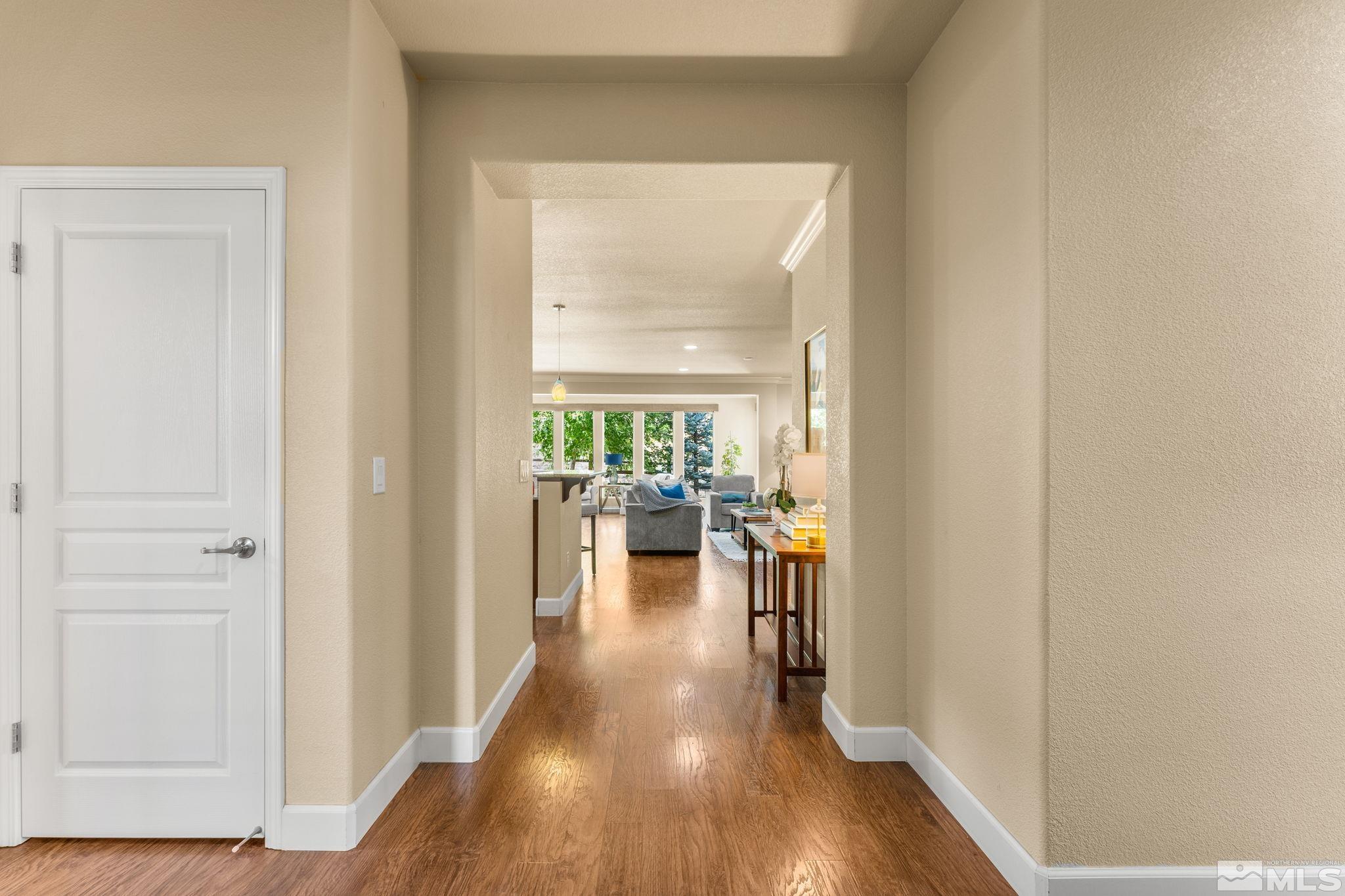 9207 Sassafras Trail Reno, NV 89523 - Photo 11 of 40 a view of a living room with hardwood floor