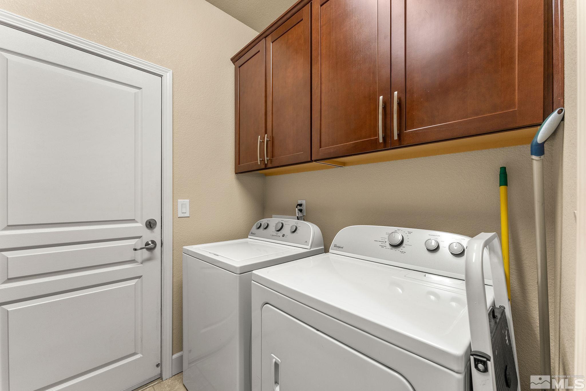 9207 Sassafras Trail Reno, NV 89523 - Photo 31 of 40 a utility room with dryer and washer