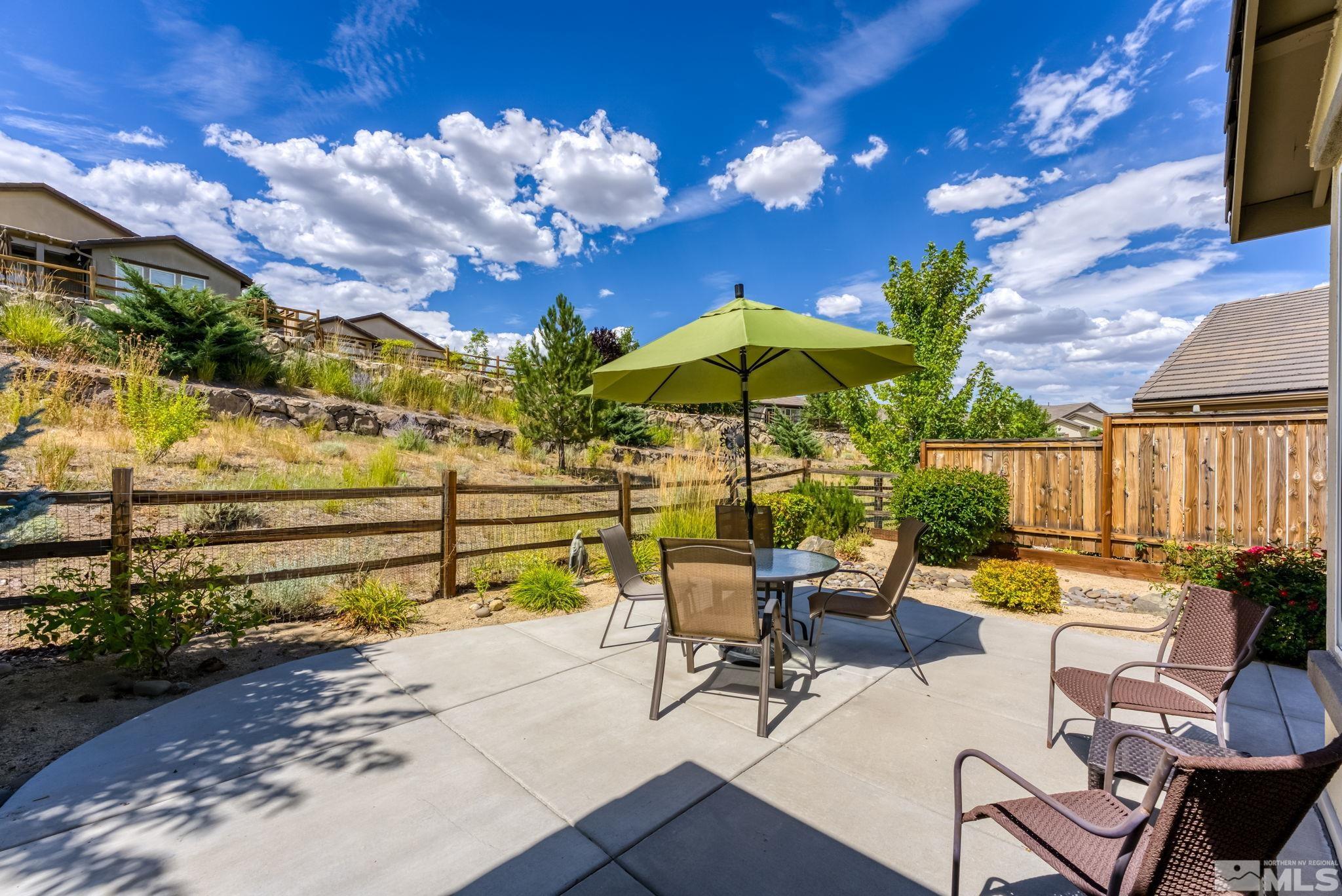 9207 Sassafras Trail Reno, NV 89523 - Photo 8 of 40 a view of a patio with swimming pool