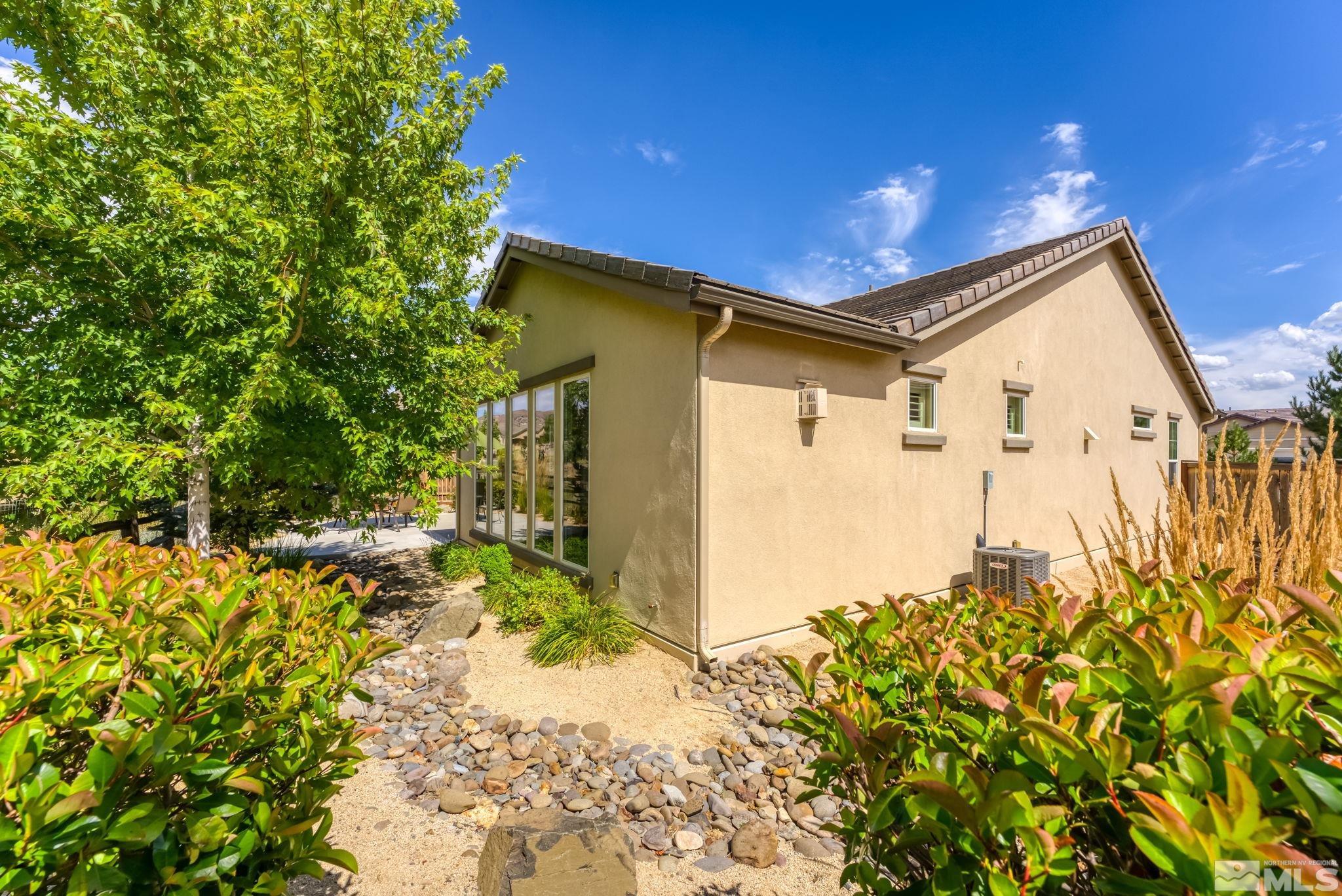 9207 Sassafras Trail Reno, NV 89523 - Photo 9 of 40 a view of a house with a yard