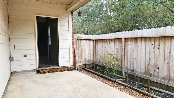 a view of a backyard of a house
