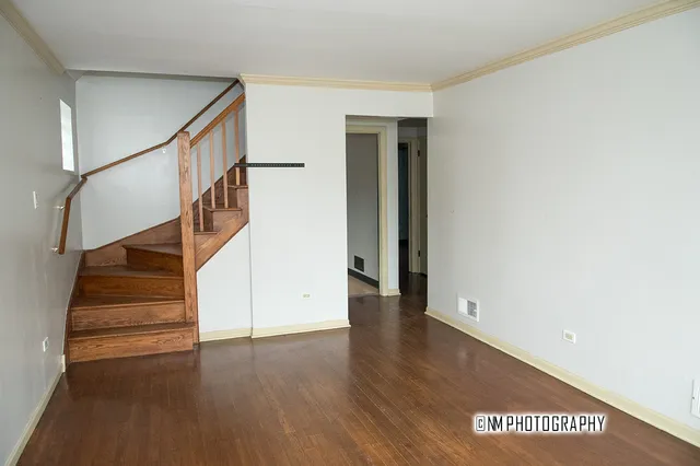 a view of entryway with wooden floor
