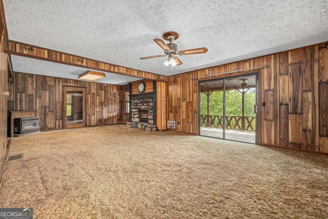 a bathroom with a shower curtain and a sink