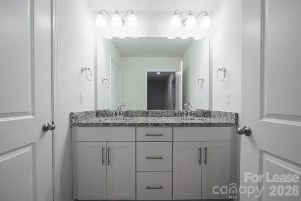 a bathroom with a bathtub and a toilet