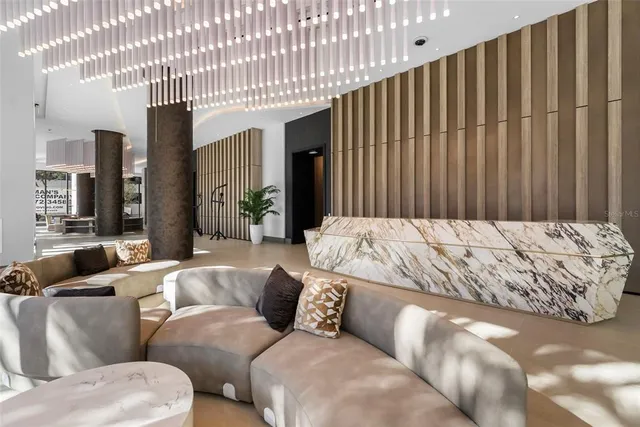 a bathroom with a shower sink vanity mirror and toilet