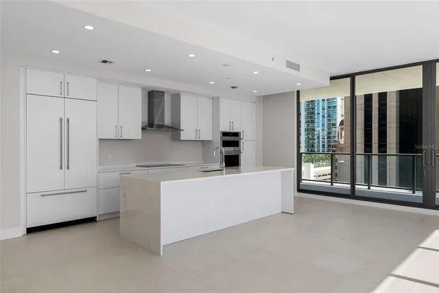 a view of a swimming pool with a lounge chairs