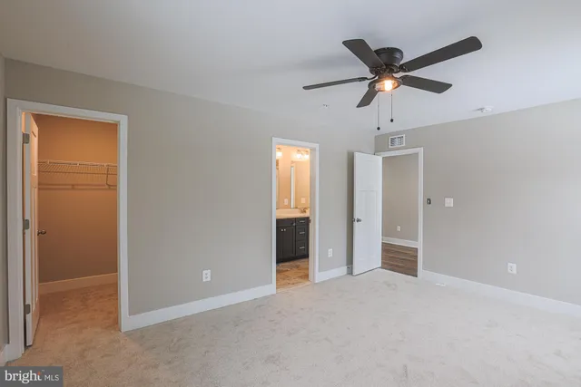 a view of a room with racks on the wall