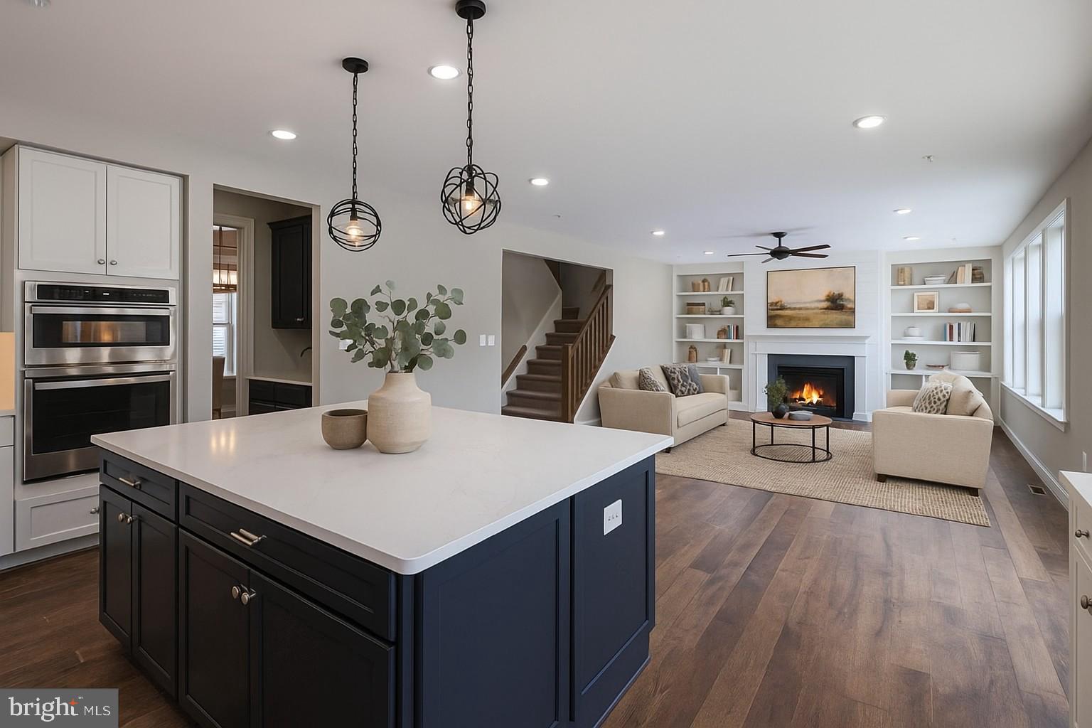 2507 Mountain Road Joppa, MD 21085 - Photo 5 of 14 a view of a kitchen area with furniture and wooden floor