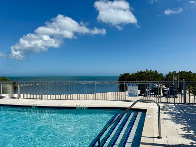 a view of a terrace with a lake view