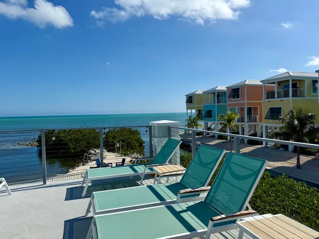 a terrace of a house with outdoor seating