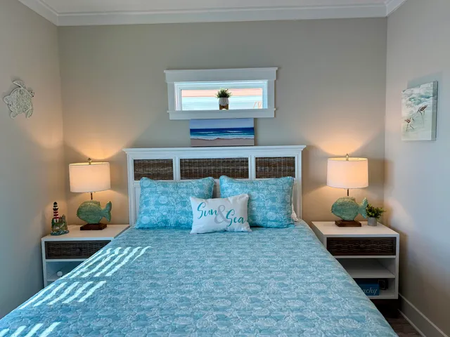 a bedroom with a bed and window