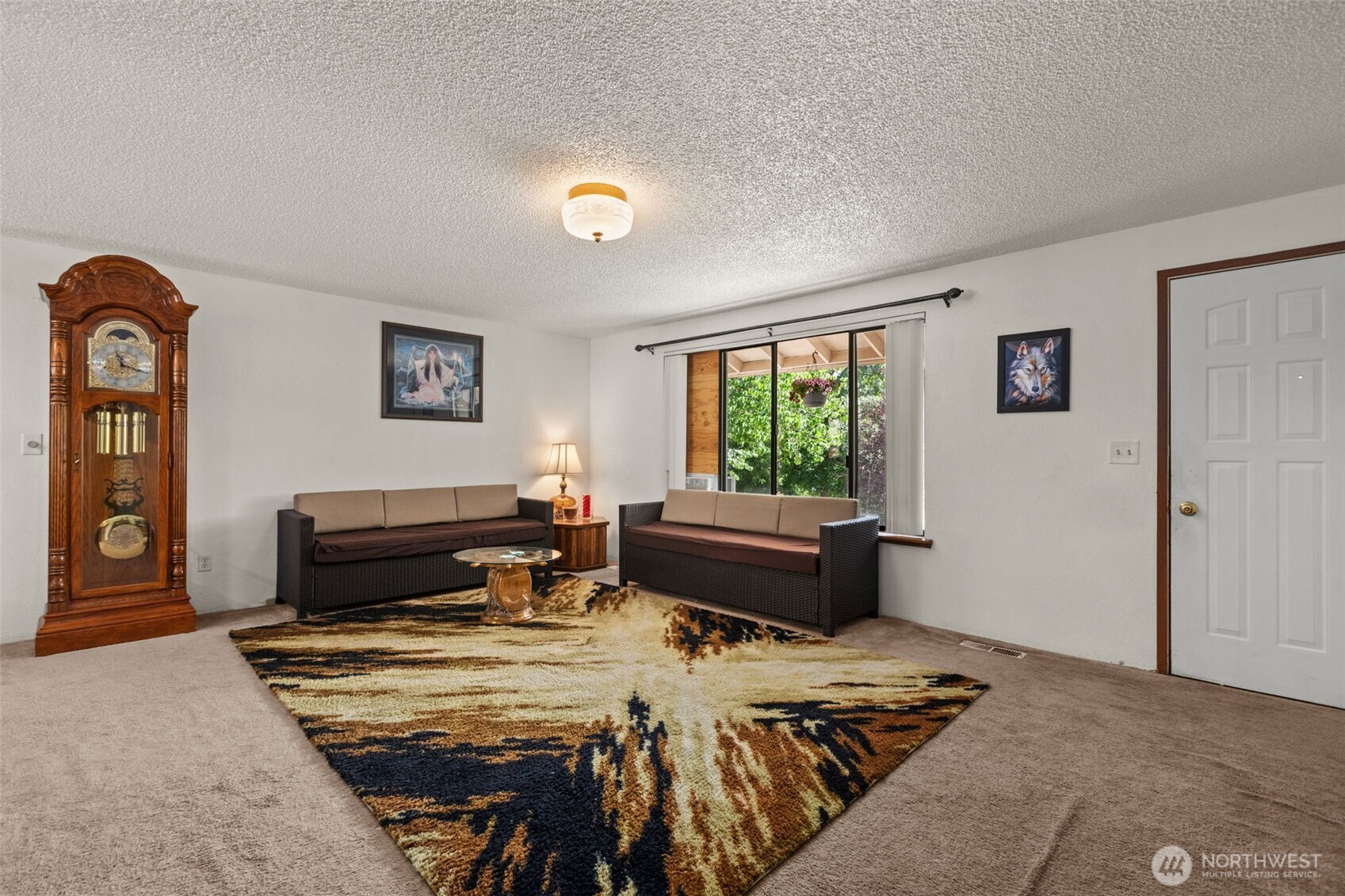 8480 Icicle Road Leavenworth, WA 98826 - Photo 3 of 40 a bedroom with furniture and a window