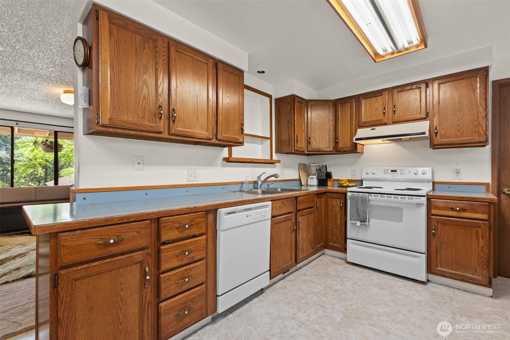 8480 Icicle Road Leavenworth, WA 98826 - Photo 8 of 40 a kitchen with granite countertop cabinets stainless steel appliances and a sink