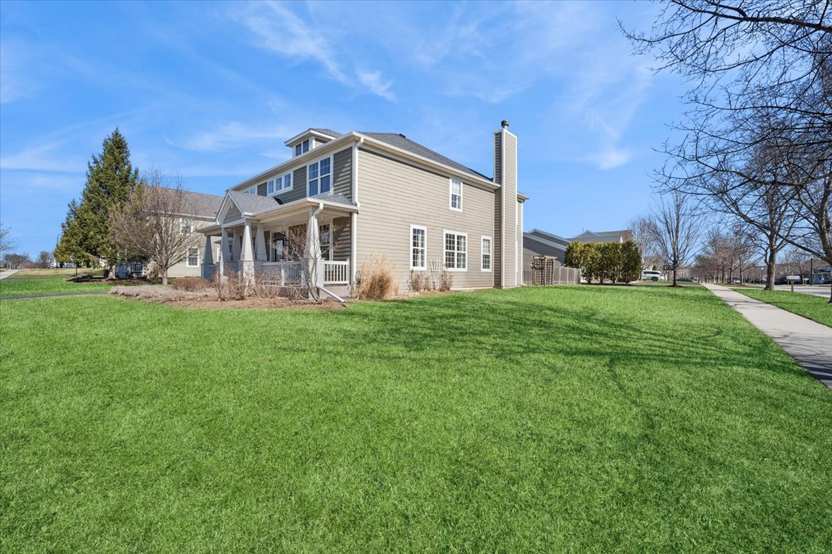 3004 Crossfire Trail Elgin, IL 60124 - Photo 21 of 25 a front view of a house with garden