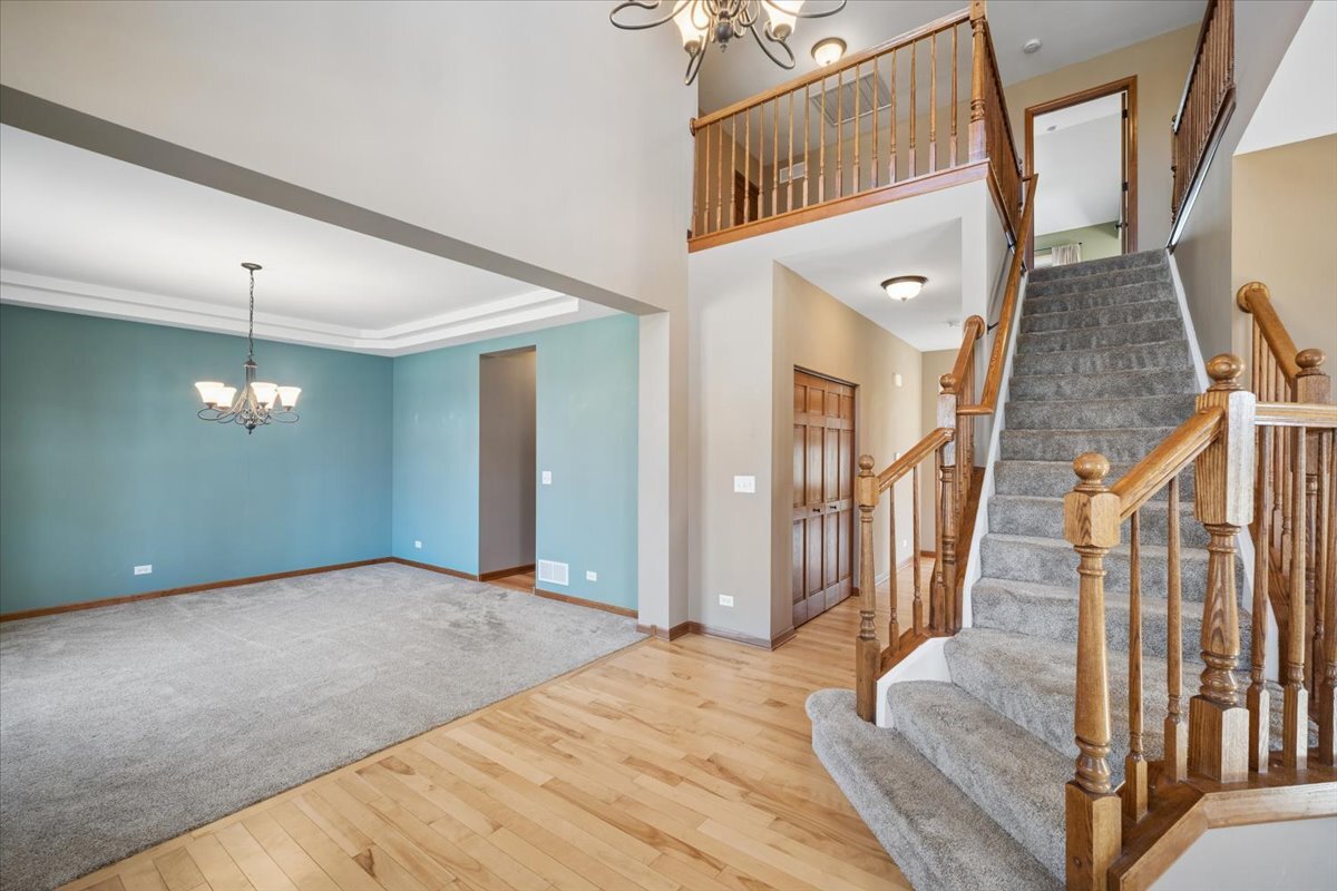 3004 Crossfire Trail Elgin, IL 60124 - Photo 3 of 25 a view of an entryway with staircase
