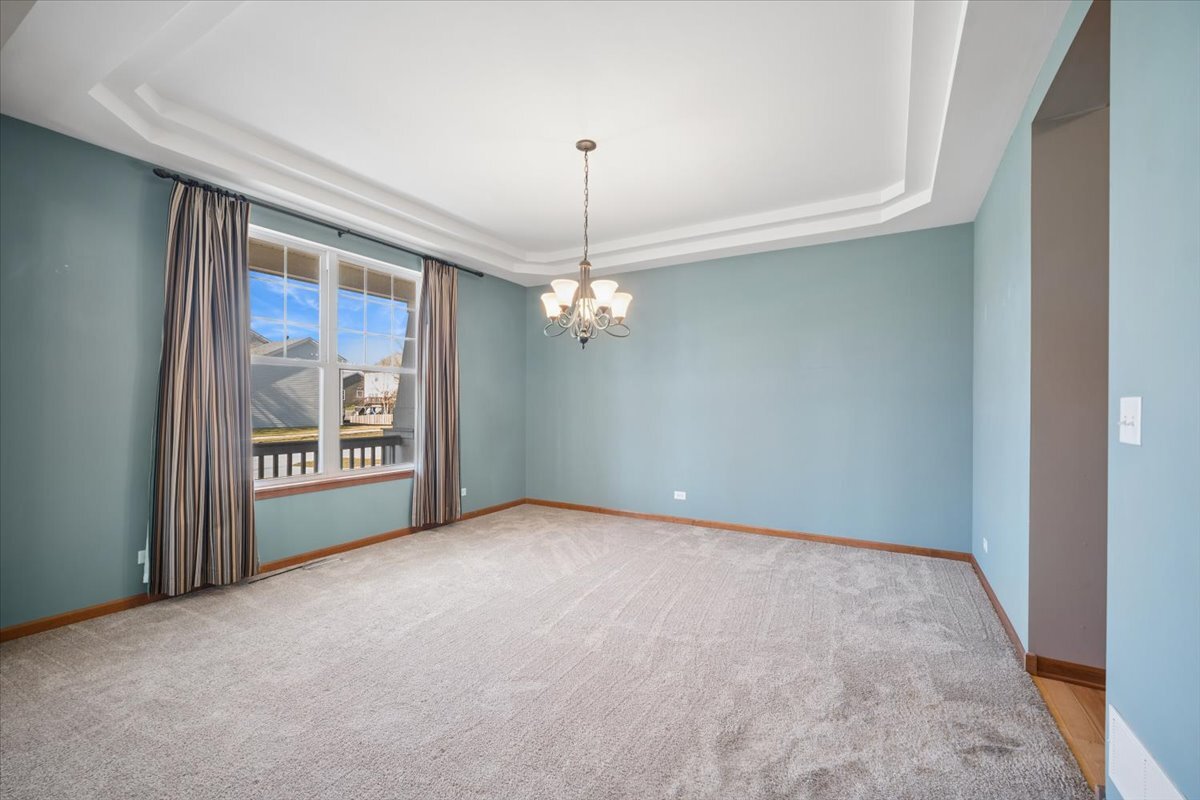 3004 Crossfire Trail Elgin, IL 60124 - Photo 4 of 25 a view of an empty room with a window