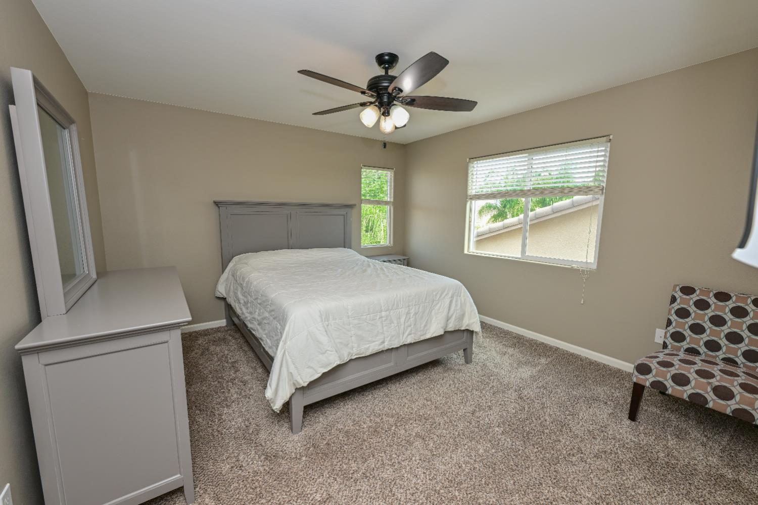 3569 Flint Avenue Clovis, CA 93619 - Photo 22 of 25 a bedroom with a bed and a window