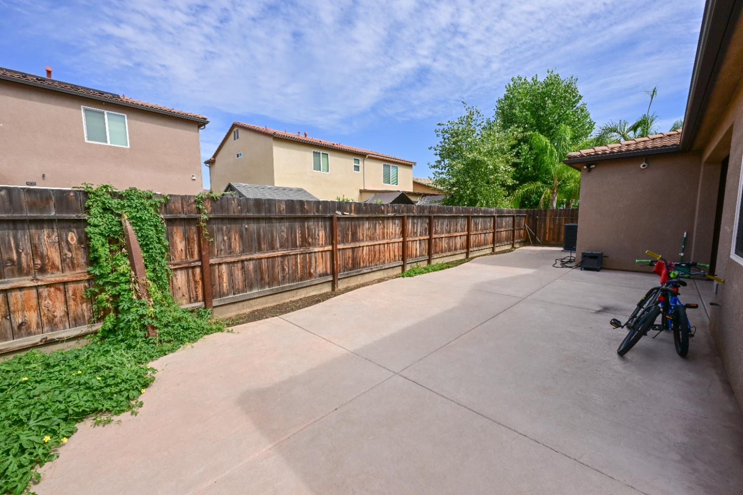 3569 Flint Avenue Clovis, CA 93619 - Photo 25 of 25 a view of a house with a wooden fence
