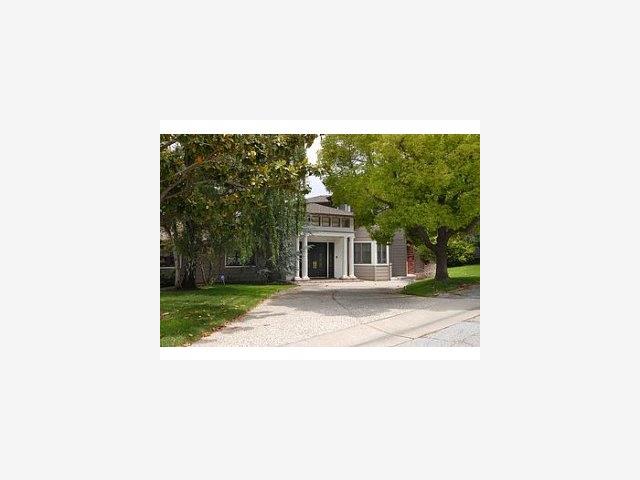 a picture of a living room with a fireplace