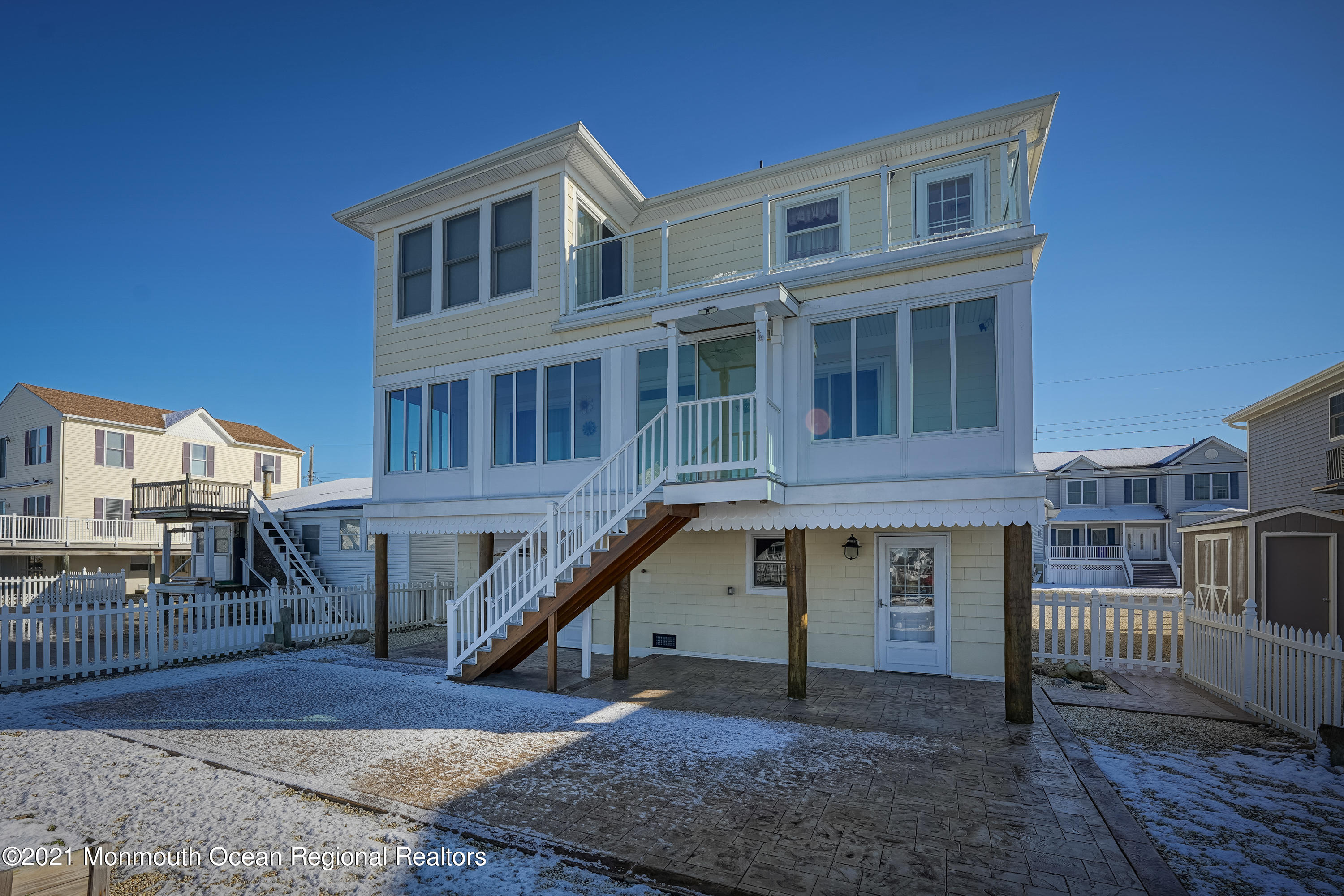 303 Heron Road Tuckerton, NJ 08087 - Photo 46 of 58 a front view of a house with a yard