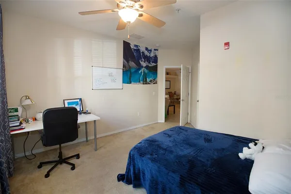 a workspace with furniture and a window