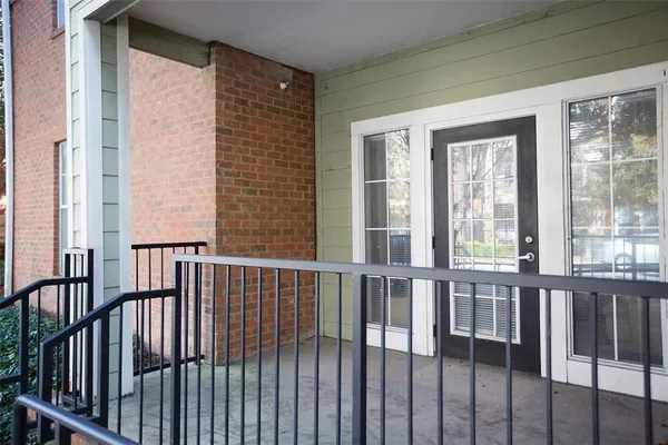 a view of a balcony with an outdoor space