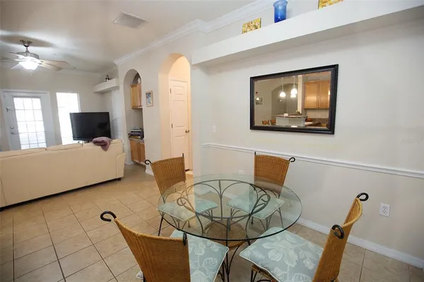 a living room with furniture and flat screen tv