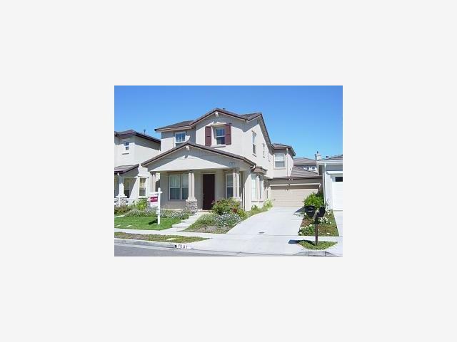 a picture of a bench in a backyard