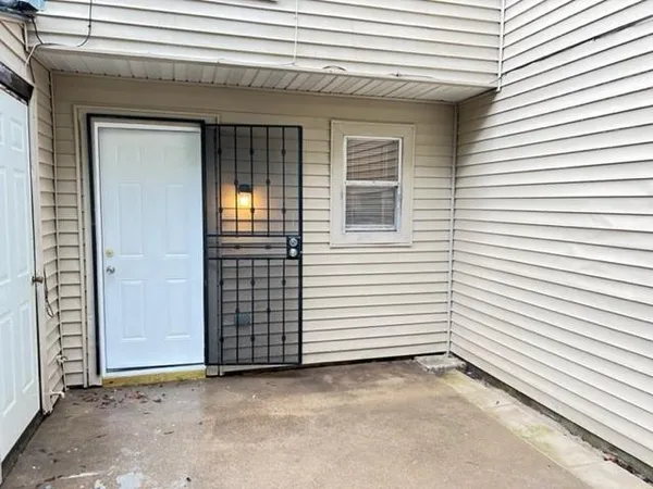 a view of a house with white door