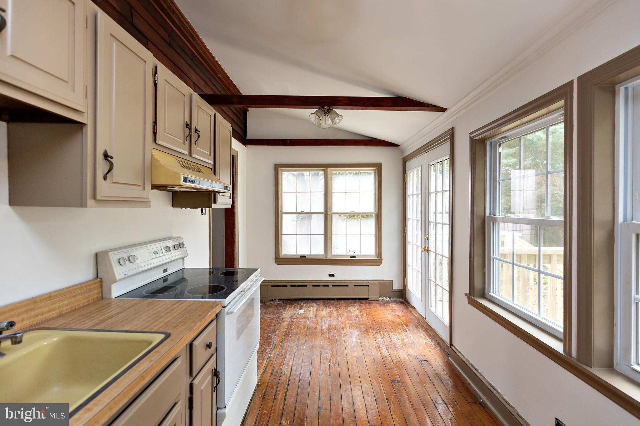 15 Jerome Terrace Clementon, NJ 08021 - Photo 11 of 33 a view of a kitchen with a sink and wooden floor