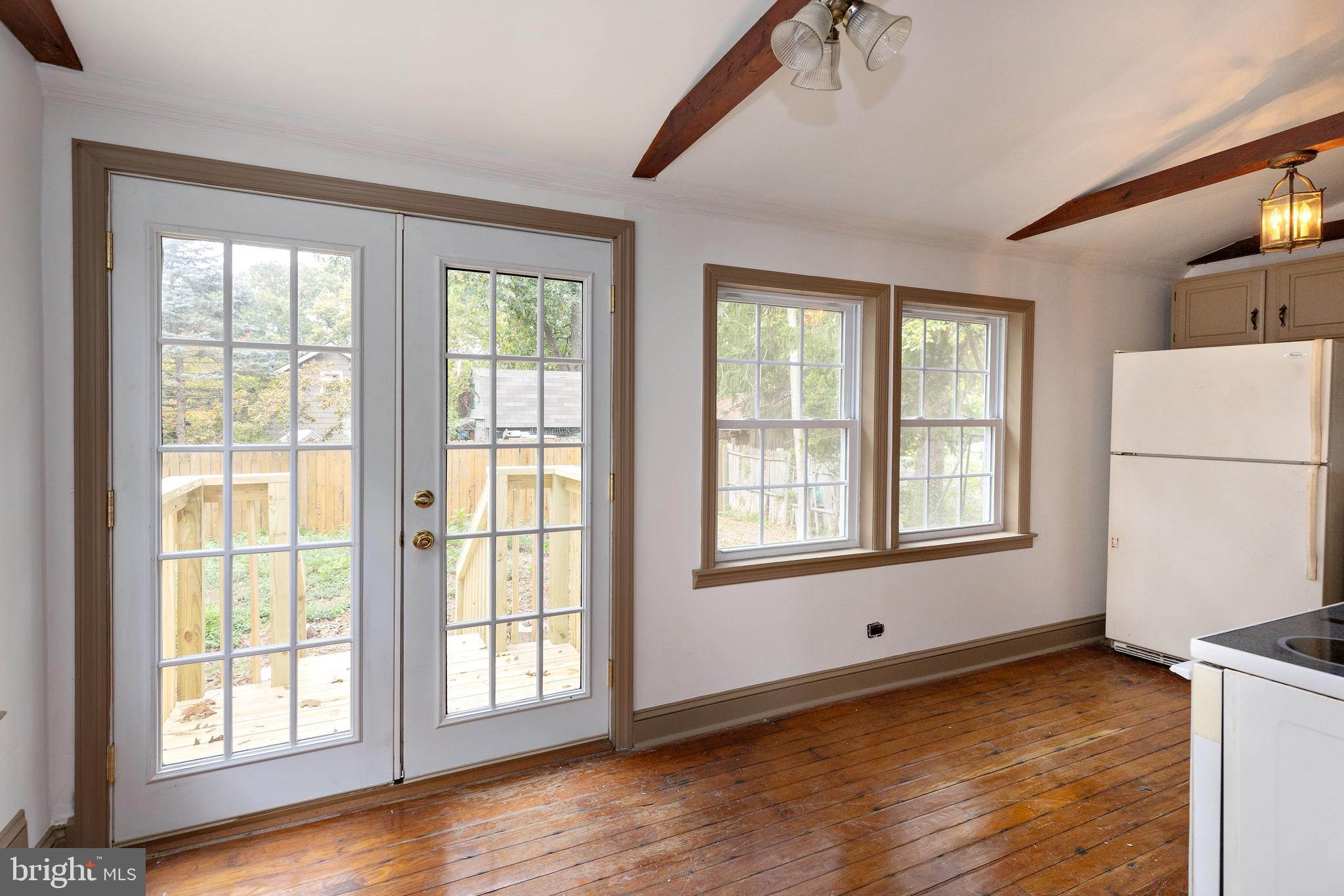 15 Jerome Terrace Clementon, NJ 08021 - Photo 12 of 33 a view of an empty room with a window and wooden floor